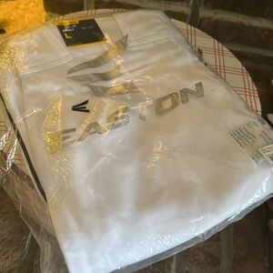 Men’s Easton Rival piped baseball pants. White with black piping. Size Large.